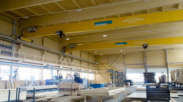 Innovative Krananlagen für Krattiger Holzbau